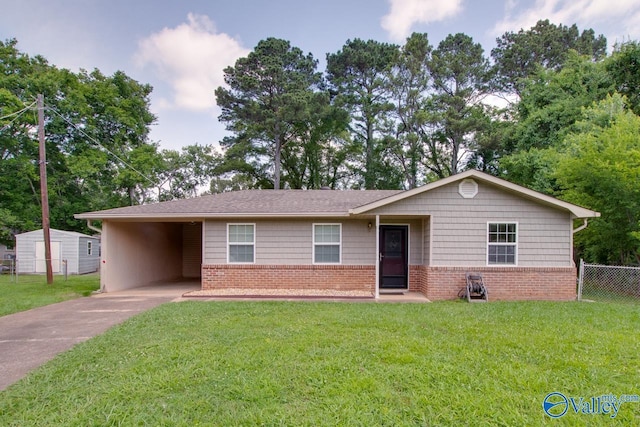2404 Yorkshire Cir SW, Huntsville, AL 35803 - ranch-style house featuring concrete driveway, brick siding, and an attached carport