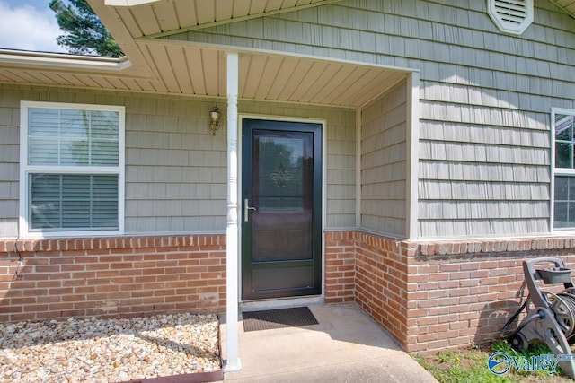 2404 Yorkshire Cir SW, Huntsville, AL 35803 - doorway to property featuring brick siding