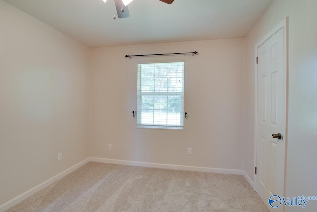 2404 Yorkshire Cir SW, Huntsville, AL 35803 - empty room featuring carpet, baseboards, and a ceiling fan