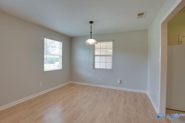 2404 Yorkshire Cir SW, Huntsville, AL 35803 - spare room with light wood finished floors and baseboards