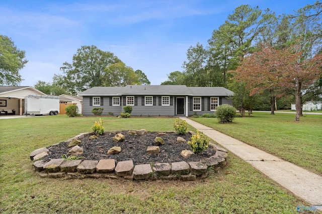 ranch-style house with a front yard