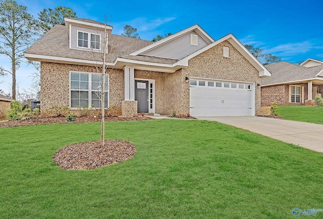 view of front of house featuring a front lawn, concrete driveway, brick siding, and a garage