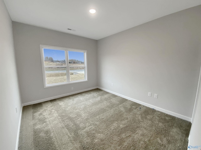 spare room with carpet flooring