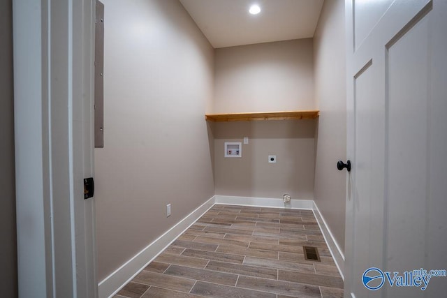 washroom featuring hookup for a washing machine, visible vents, hookup for an electric dryer, wood tiled floor, and laundry area