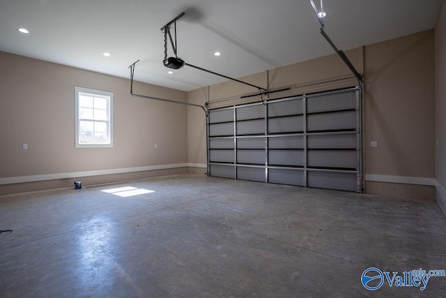 garage featuring recessed lighting, a garage door opener, and baseboards