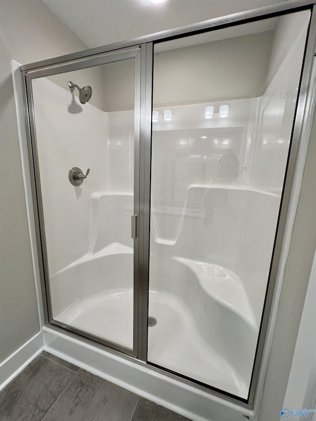 bathroom with a stall shower