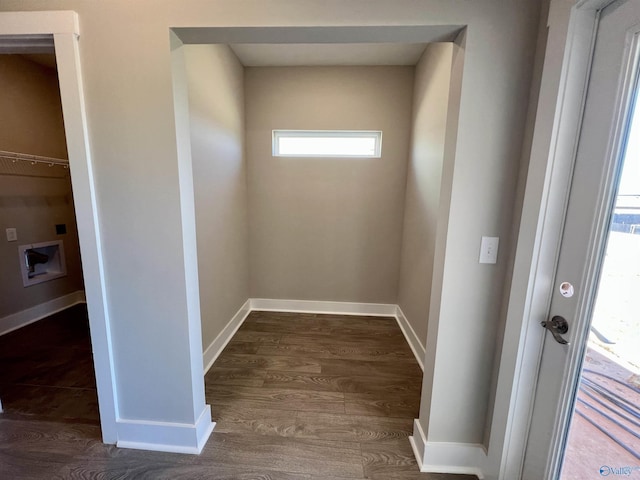 interior space with dark wood finished floors and baseboards