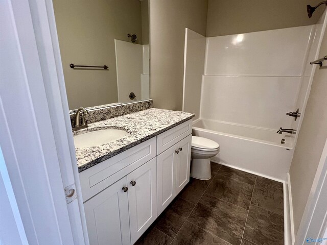 bathroom featuring shower / washtub combination, vanity, and toilet