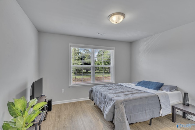 bedroom featuring light hardwood / wood-style floors