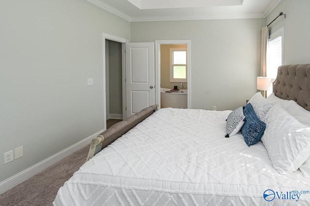 carpeted bedroom featuring connected bathroom