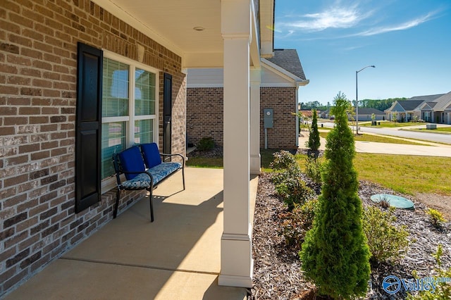 view of patio featuring a porch