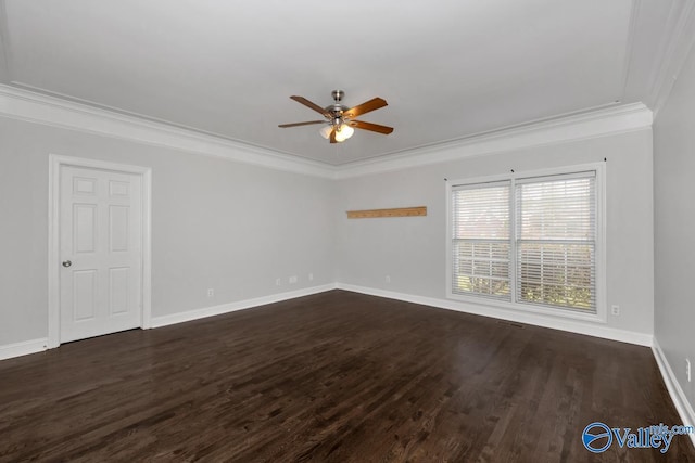 spare room with dark wood-type flooring, ceiling fan, and ornamental molding