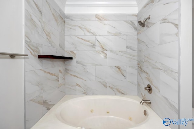 bathroom featuring tiled shower / bath