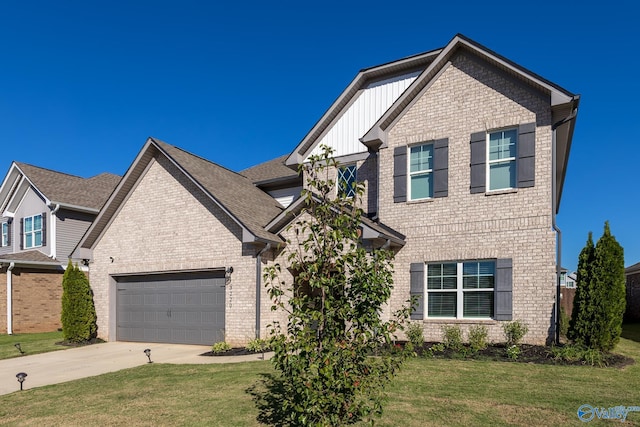 craftsman-style house featuring a front lawn and a garage