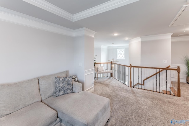 carpeted living room featuring ornamental molding