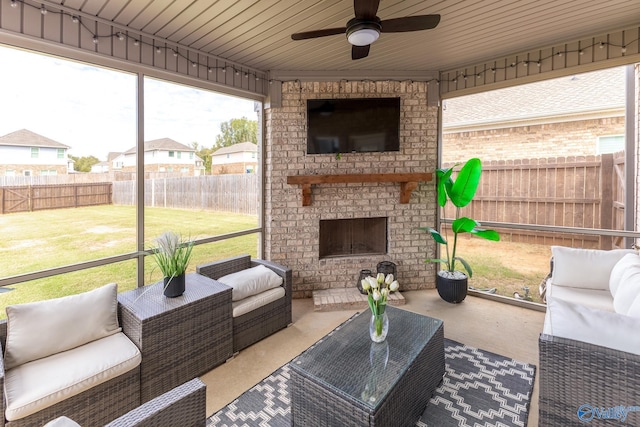 sunroom / solarium with ceiling fan and wood ceiling