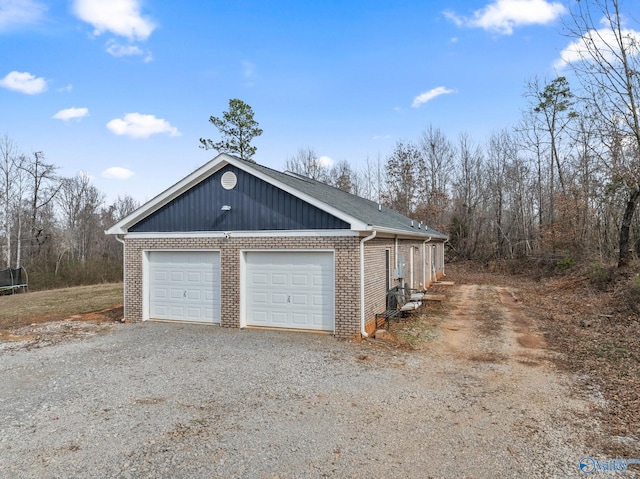 garage with driveway