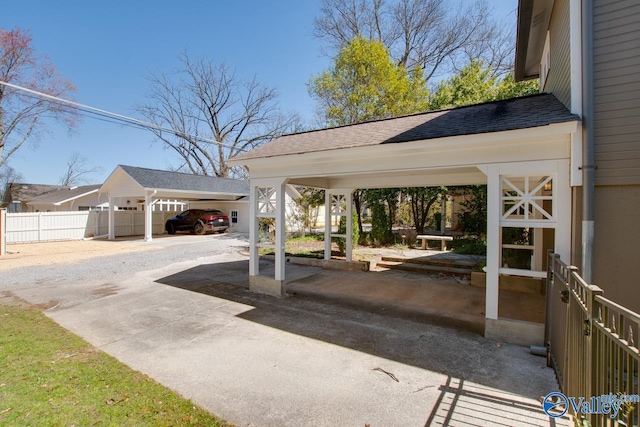 exterior space with a gazebo and fence