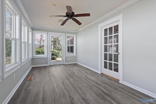 839 Bow Range Rd, Guntersville, AL 35976 - unfurnished sunroom with crown molding, a wooden deck, visible vents, wood finished floors, and baseboards