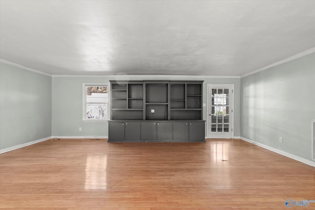 839 Bow Range Rd, Guntersville, AL 35976 - unfurnished living room with light wood-style floors, baseboards, ornamental molding, and visible vents