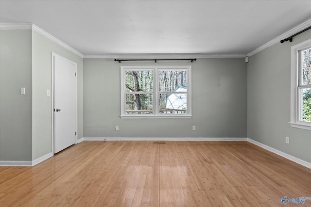 839 Bow Range Rd, Guntersville, AL 35976 - spare room with ornamental molding, baseboards, and light wood finished floors
