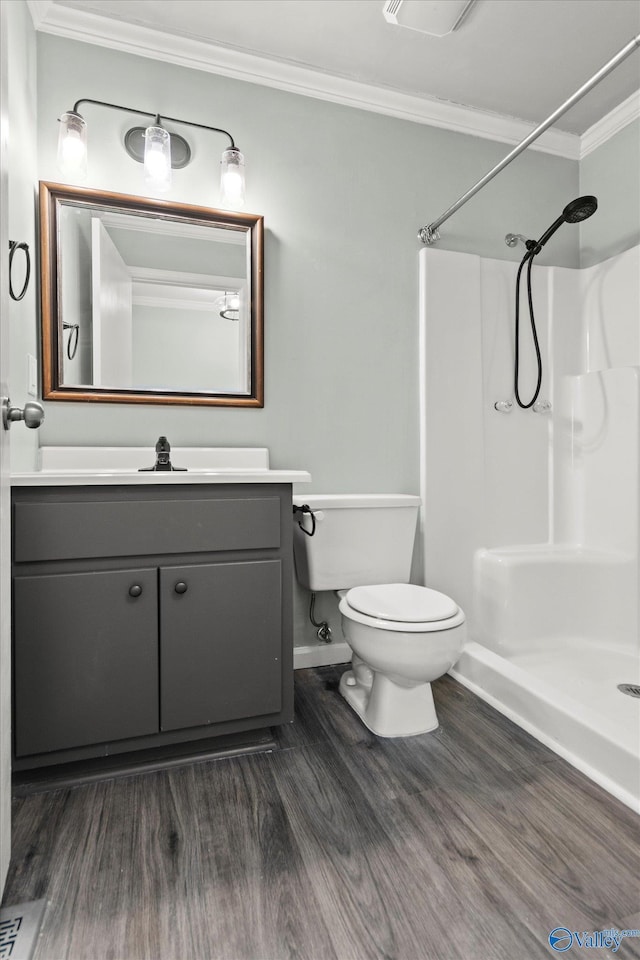 839 Bow Range Rd, Guntersville, AL 35976 - full bathroom with vanity, ornamental molding, toilet, a shower, and wood finished floors