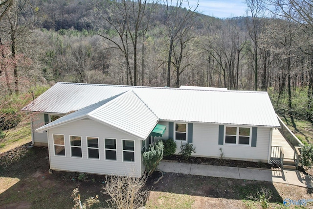 839 Bow Range Rd, Guntersville, AL 35976 - view of front of house with a view of trees and metal roof