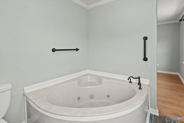 839 Bow Range Rd, Guntersville, AL 35976 - bathroom featuring ornamental molding, toilet, and a tub with jets