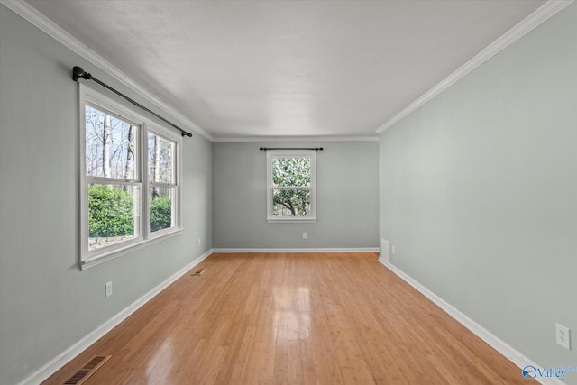 839 Bow Range Rd, Guntersville, AL 35976 - unfurnished room featuring visible vents, light wood-type flooring, baseboards, and ornamental molding