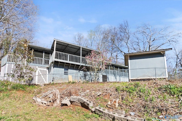 839 Bow Range Rd, Guntersville, AL 35976 - rear view of house with a sunroom