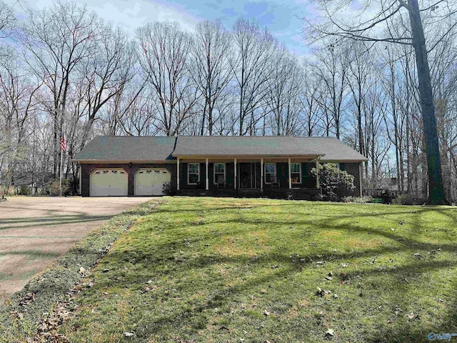 ranch-style house featuring a front lawn, concrete driveway, brick siding, and an attached garage