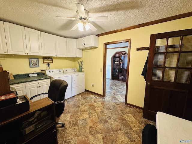 office area featuring a ceiling fan, ornamental molding, a textured ceiling, washer and dryer, and baseboards