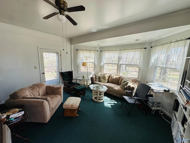 sunroom / solarium with a ceiling fan