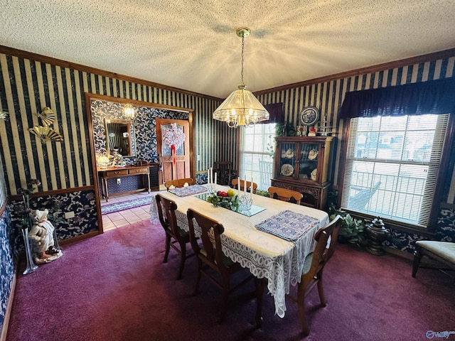 dining space featuring carpet floors, a textured ceiling, and wallpapered walls