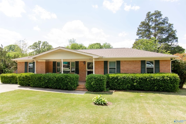 ranch-style home with a front yard