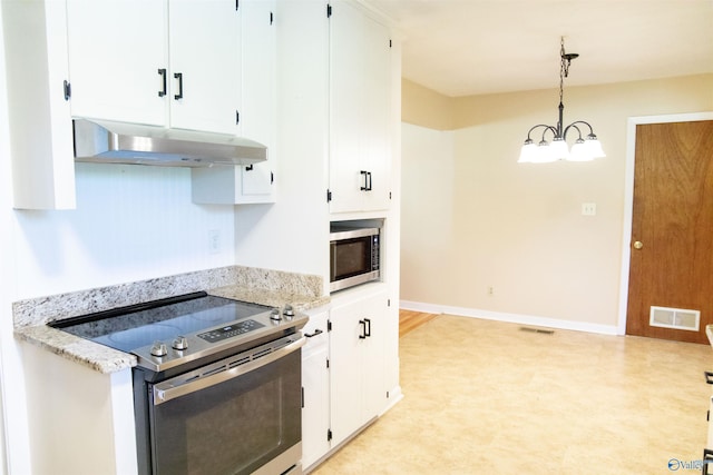 kitchen with white cabinetry, appliances with stainless steel finishes, and hanging light fixtures