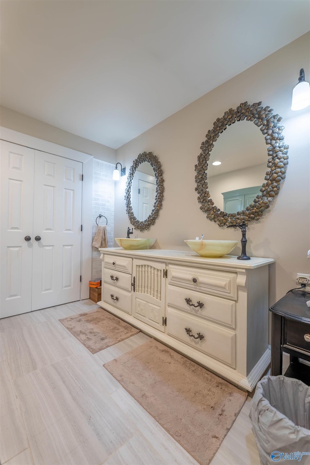 full bath featuring wood finished floors and vanity