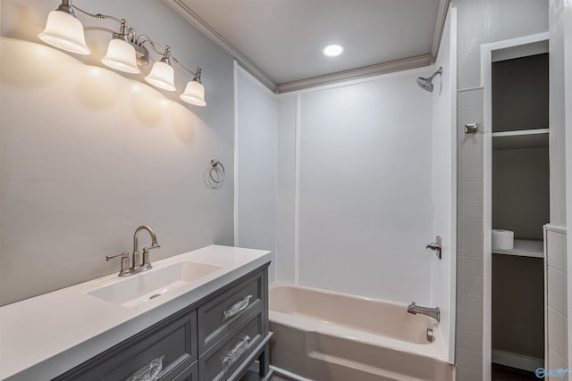 bathroom with vanity and bathing tub / shower combination