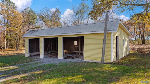 garage with a lawn