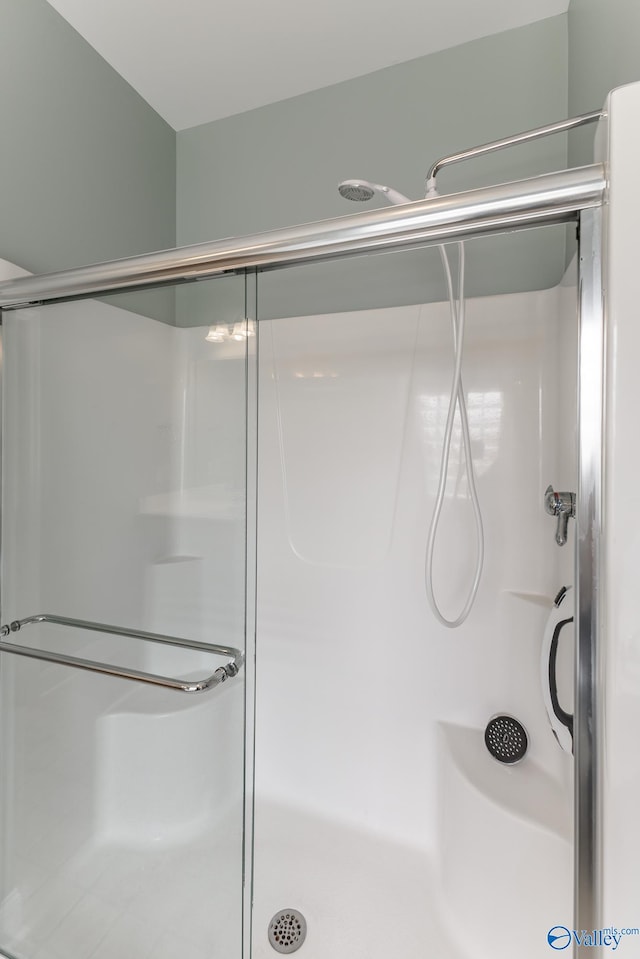 bathroom featuring walk in shower