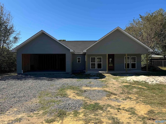 single story home with covered porch