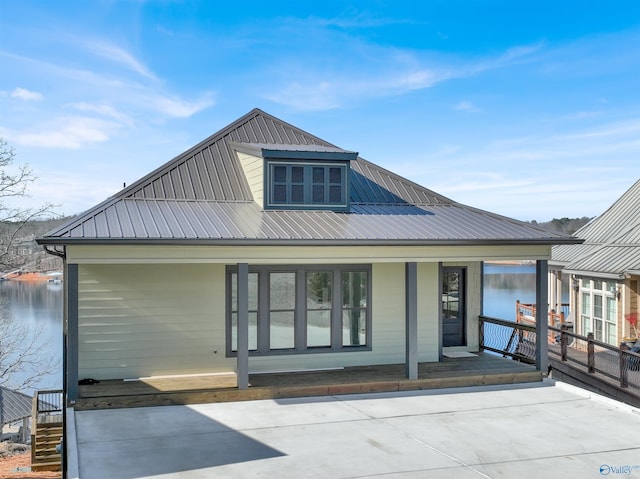 view of front of home featuring a water view and a porch