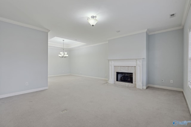 unfurnished living room with a fireplace, light colored carpet, a chandelier, and ornamental molding