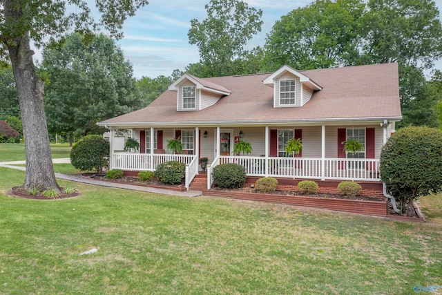 view of front of house featuring a front yard and a porch