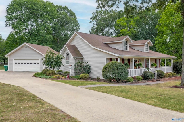 view of front of house with a porch, a garage, and a front yard