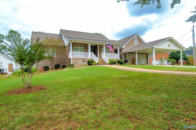 view of front of home featuring a porch, a garage, and a front yard