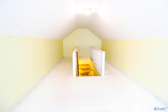 bonus room with vaulted ceiling