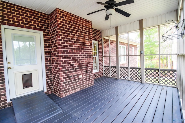 wooden deck with ceiling fan