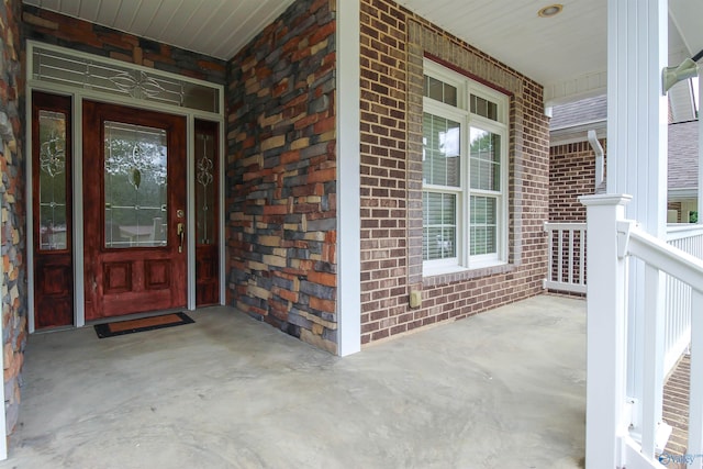 entrance to property with a porch