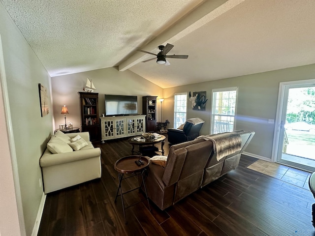 535 10th St NW, Arab, AL 35016 - living area with dark wood finished floors, baseboards, a textured ceiling, ceiling fan, and plenty of natural light